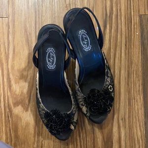 Never worn Salpy heels with 2 inch heel!